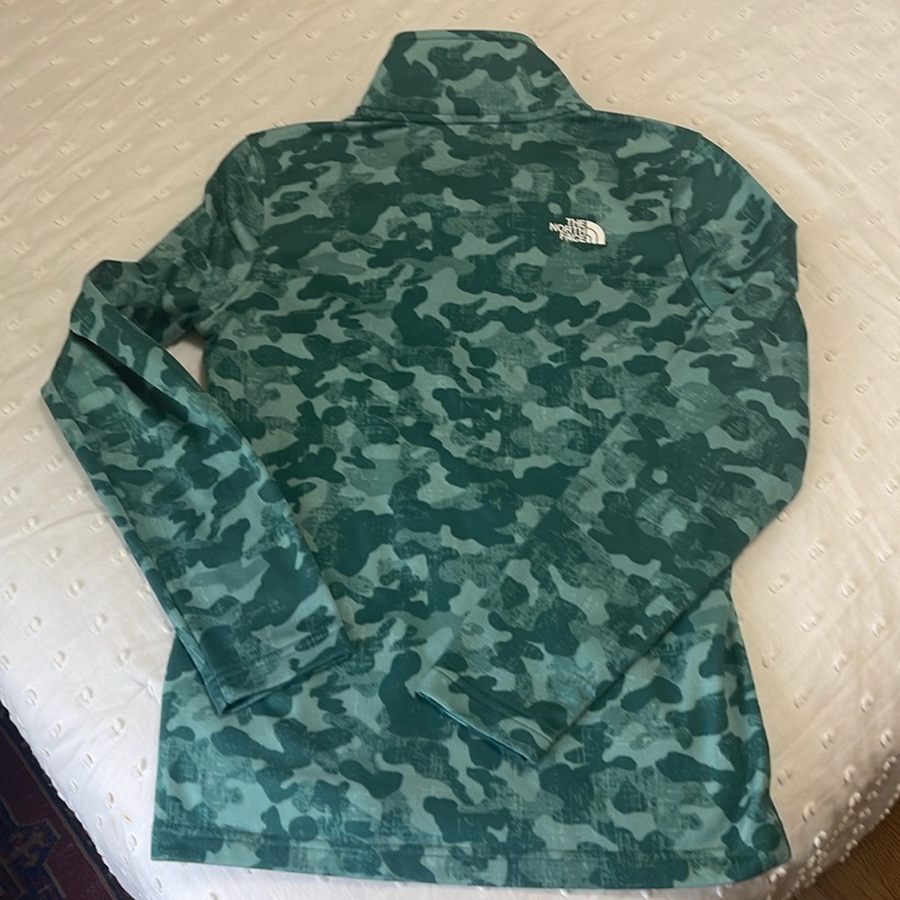 The North Face camouflage half zip pull over